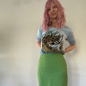Unique, vintage leopard sweater top with striped sleeve tips!